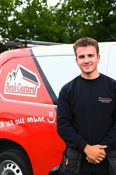 Ben's Gutters Bristol gutter cleaning technician beside branded service van