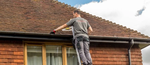 Gutter cleaning a residential property in Bristol