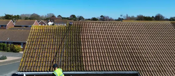Roof cleaning a healthcare centre in Bristol